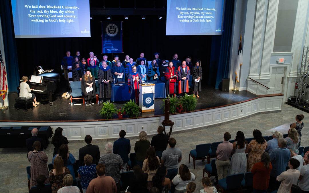 Dr. Yowell leads the congregation in the Alma Mater.