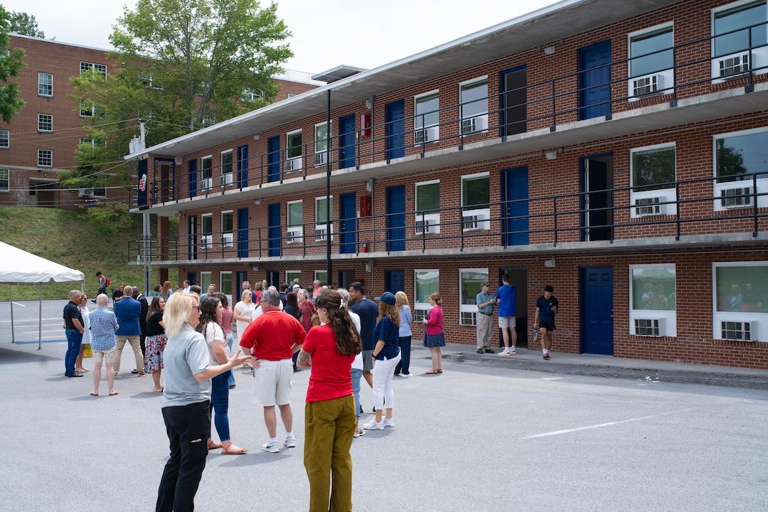 Alumni, friends, and employees gathered outside Alumni Hall.