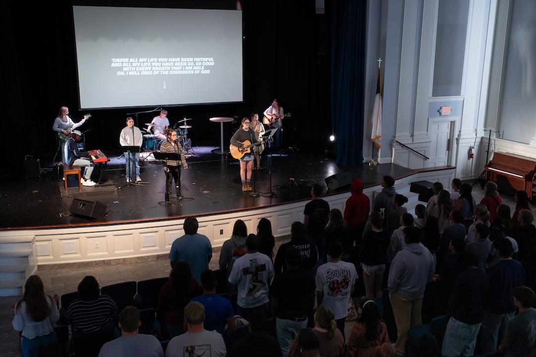 Students lead worship in Harman Chapel.