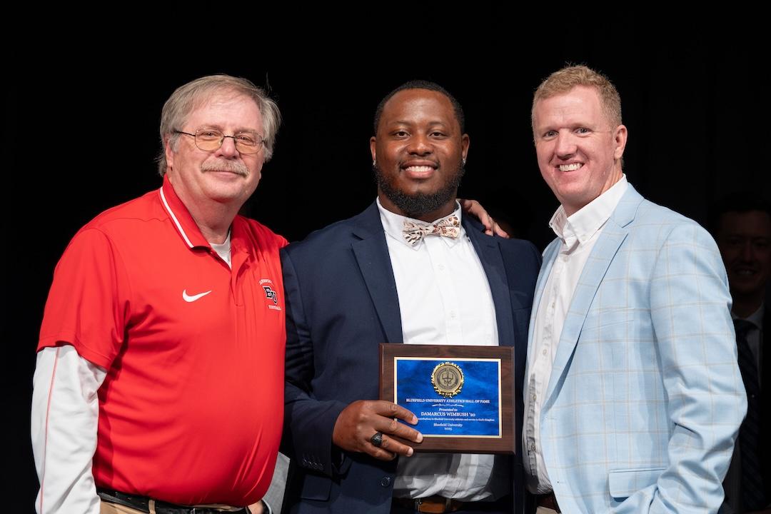 DaMarcus Wimbush receives an award.