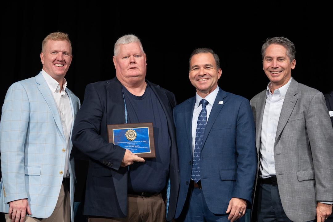 Mike White receives an award.