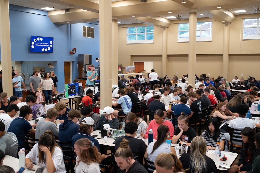 Students play bingo in the cafeteria.