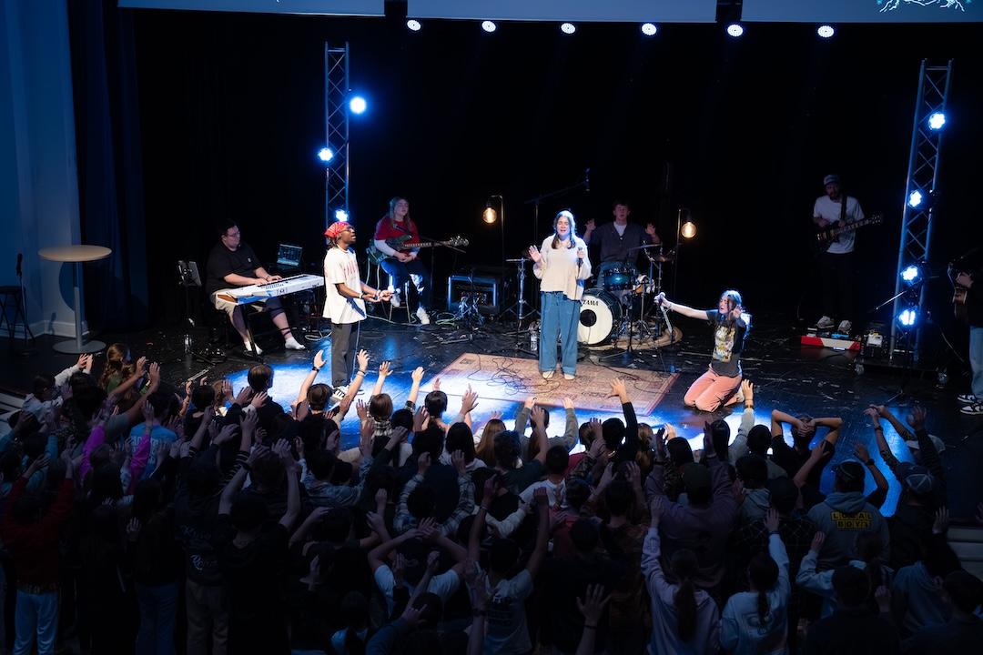 Winter-Blast-2026 A crowd of worshippers raising their hands.