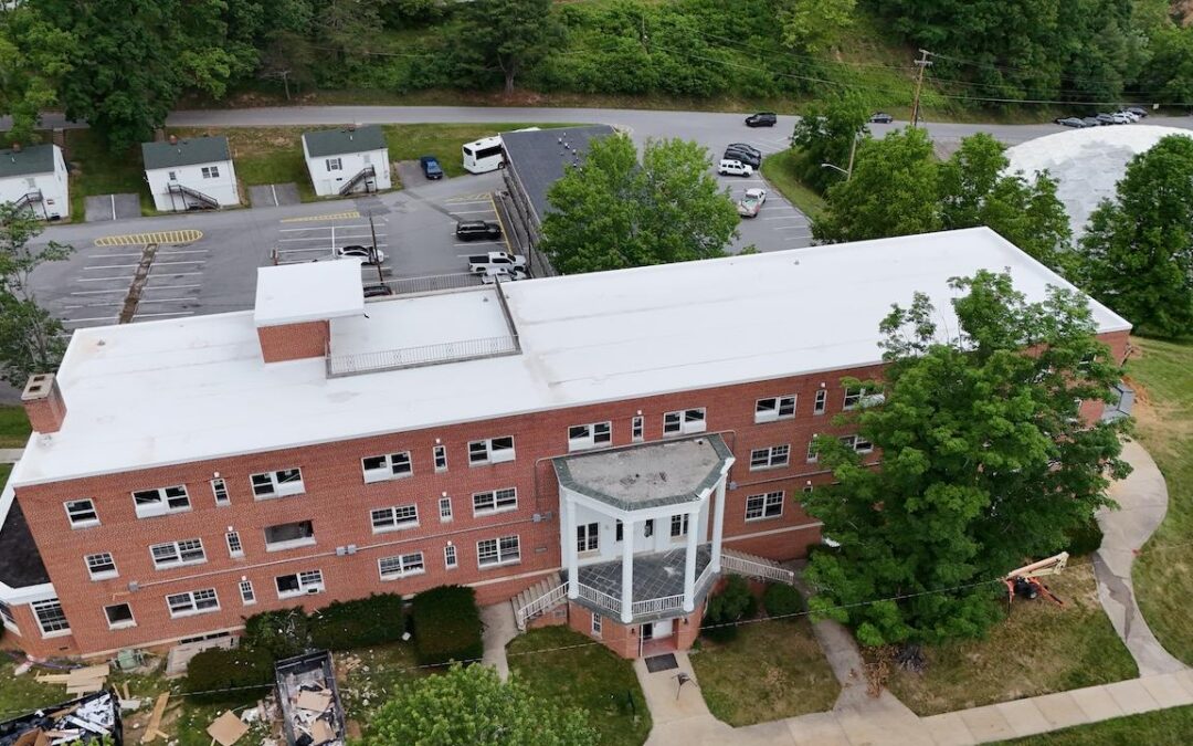 An aerial view of Rish Hall in summer 2026.