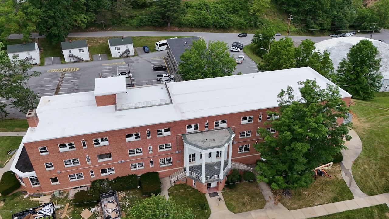 An aerial view of Rish Hall in summer 2026.