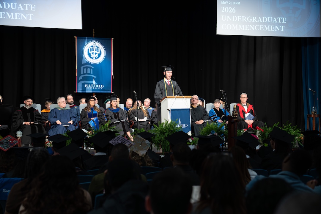 Commencement-1 A male graduate speaks at a commencement ceremony