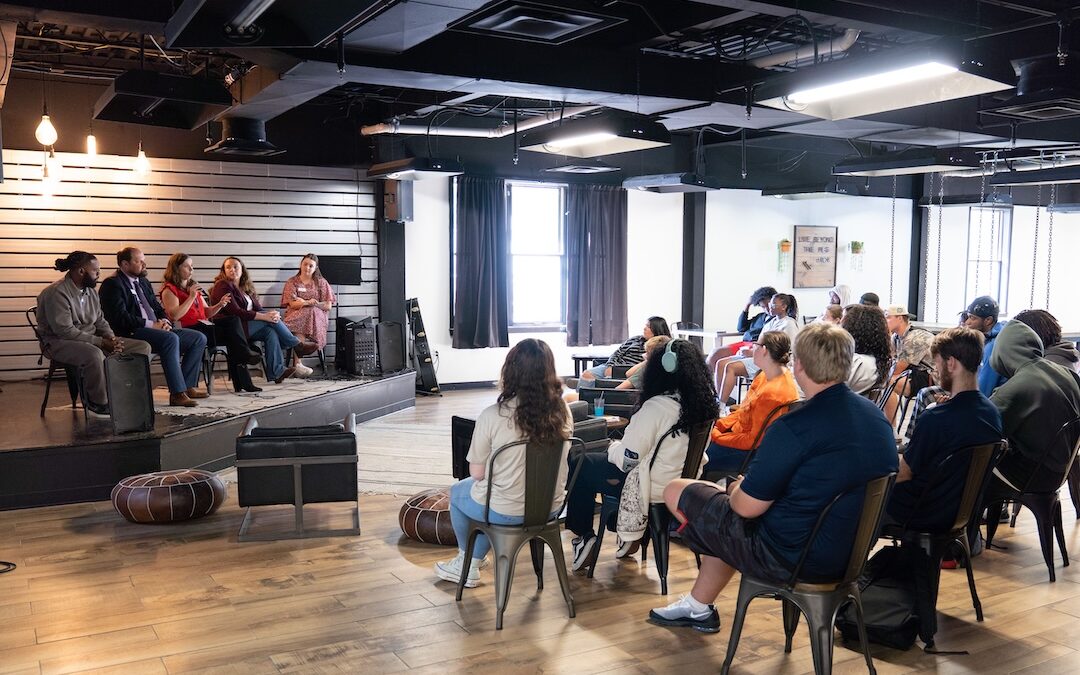 A panel of alumni speaks to current students