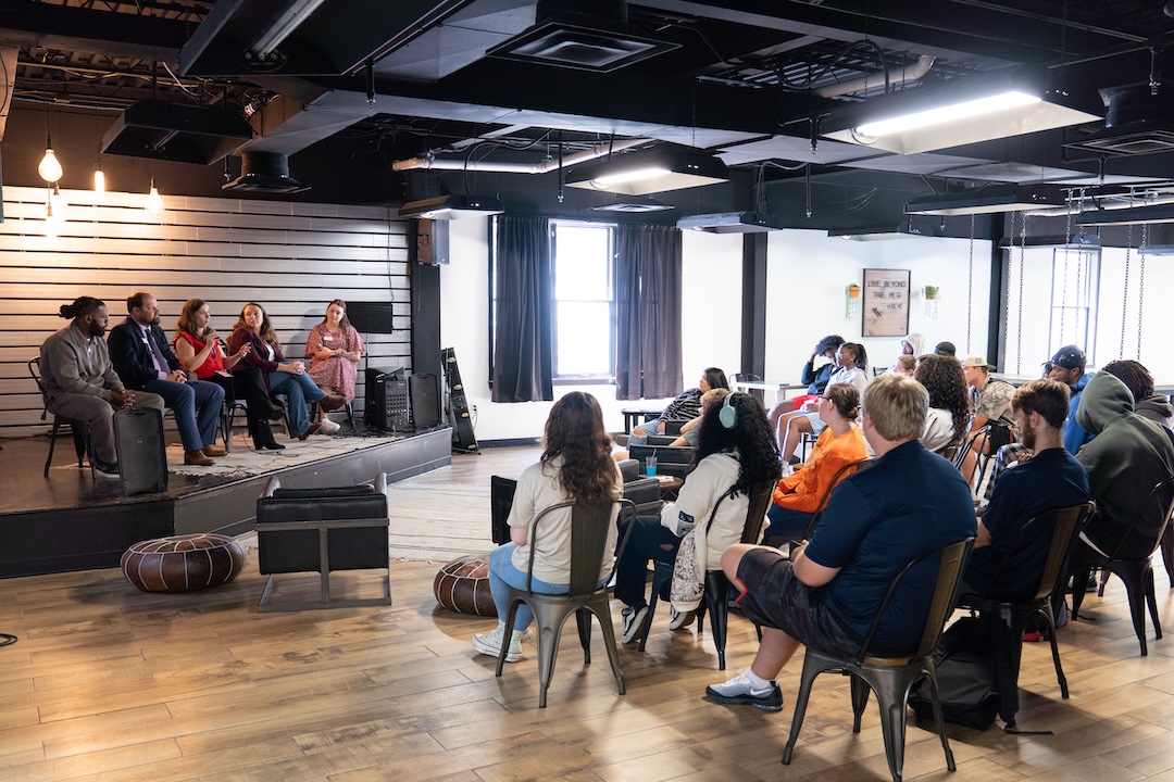 A panel of alumni speaks to current students